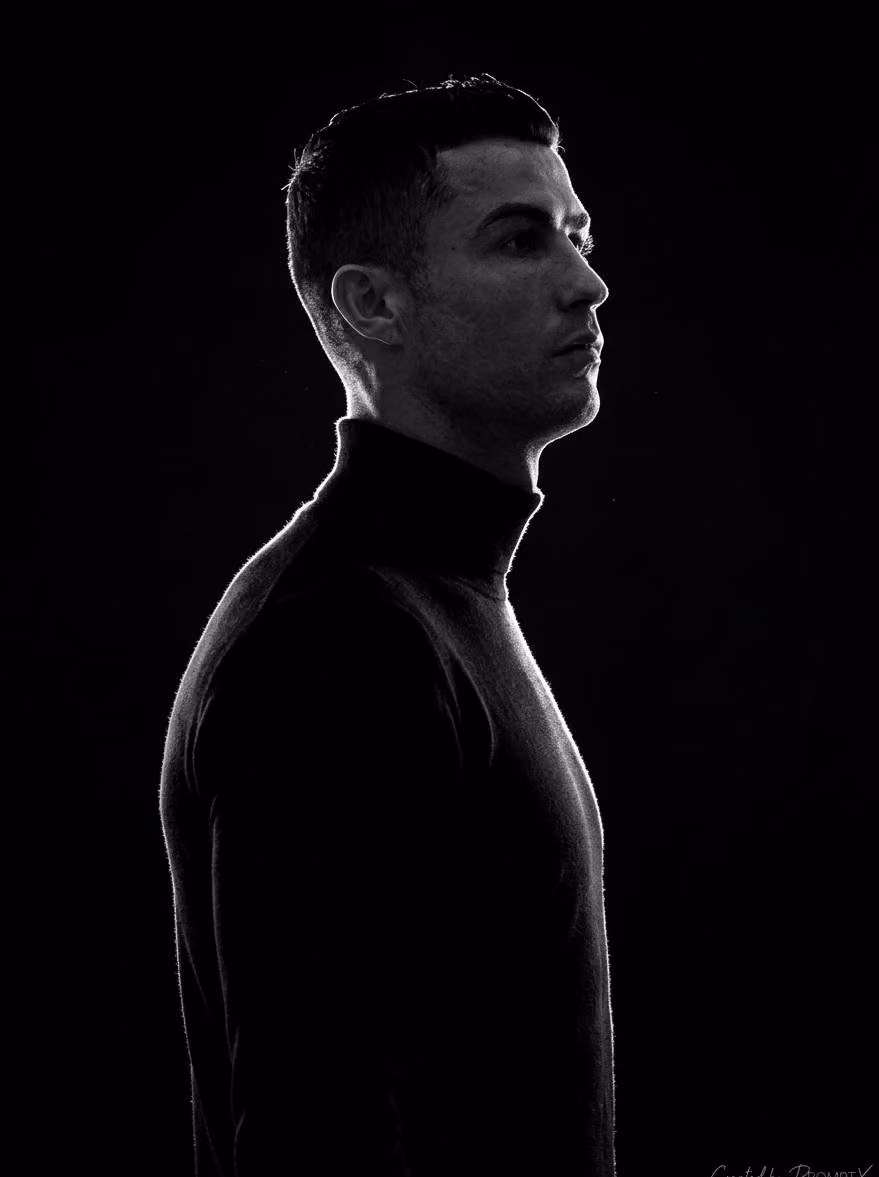 A stark, high-contrast, black-and-white (monochromatic) side