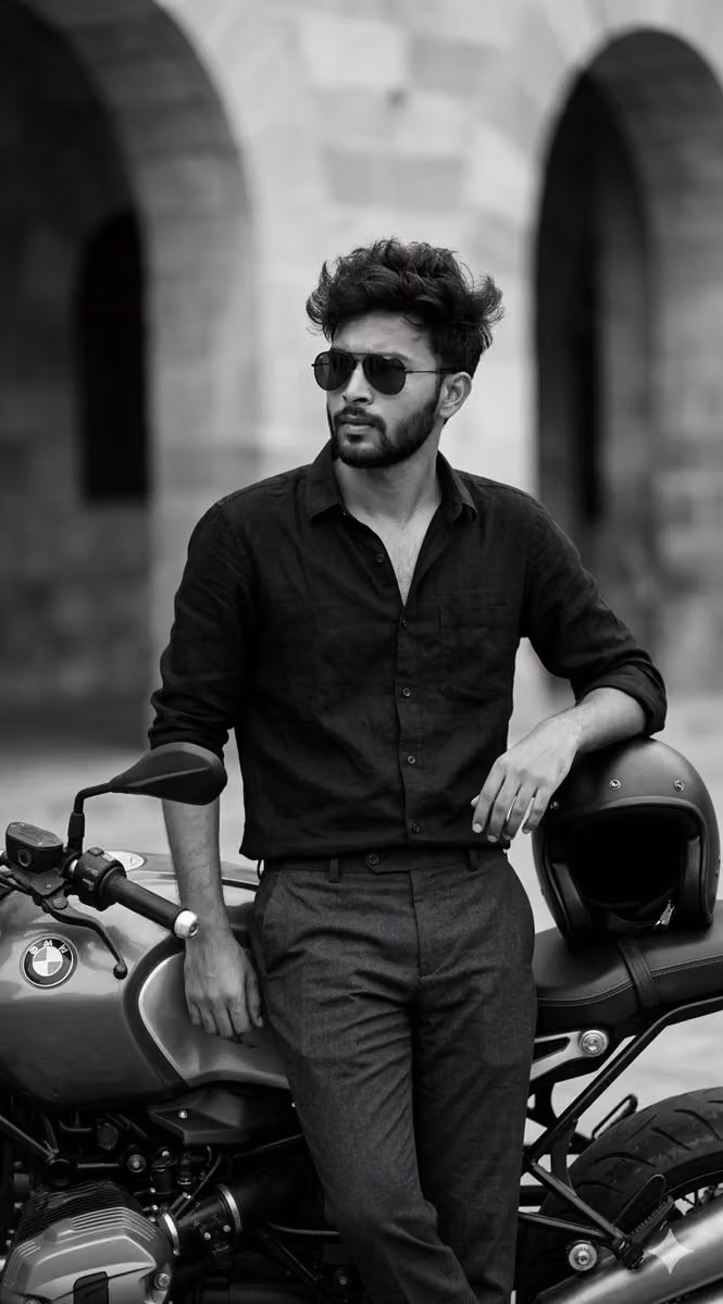 Cinematic B&W Portrait of Man with Motorcycle
