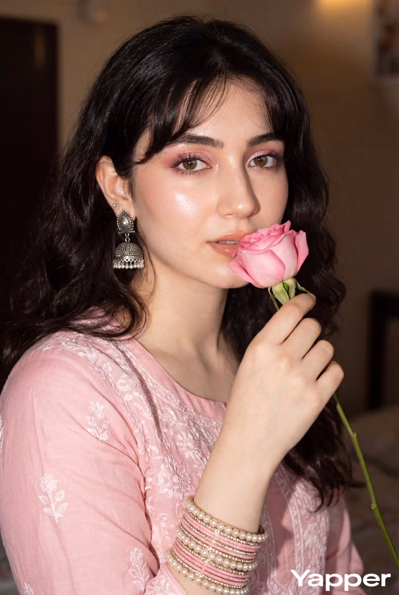Glamorous Portrait with Pink Rose and Traditional Outfit