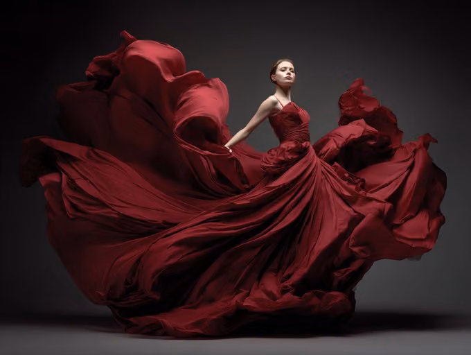 Capturing mid-movement garment with flowing fabric, frozen elegance, studio wind effect, dynamic dra