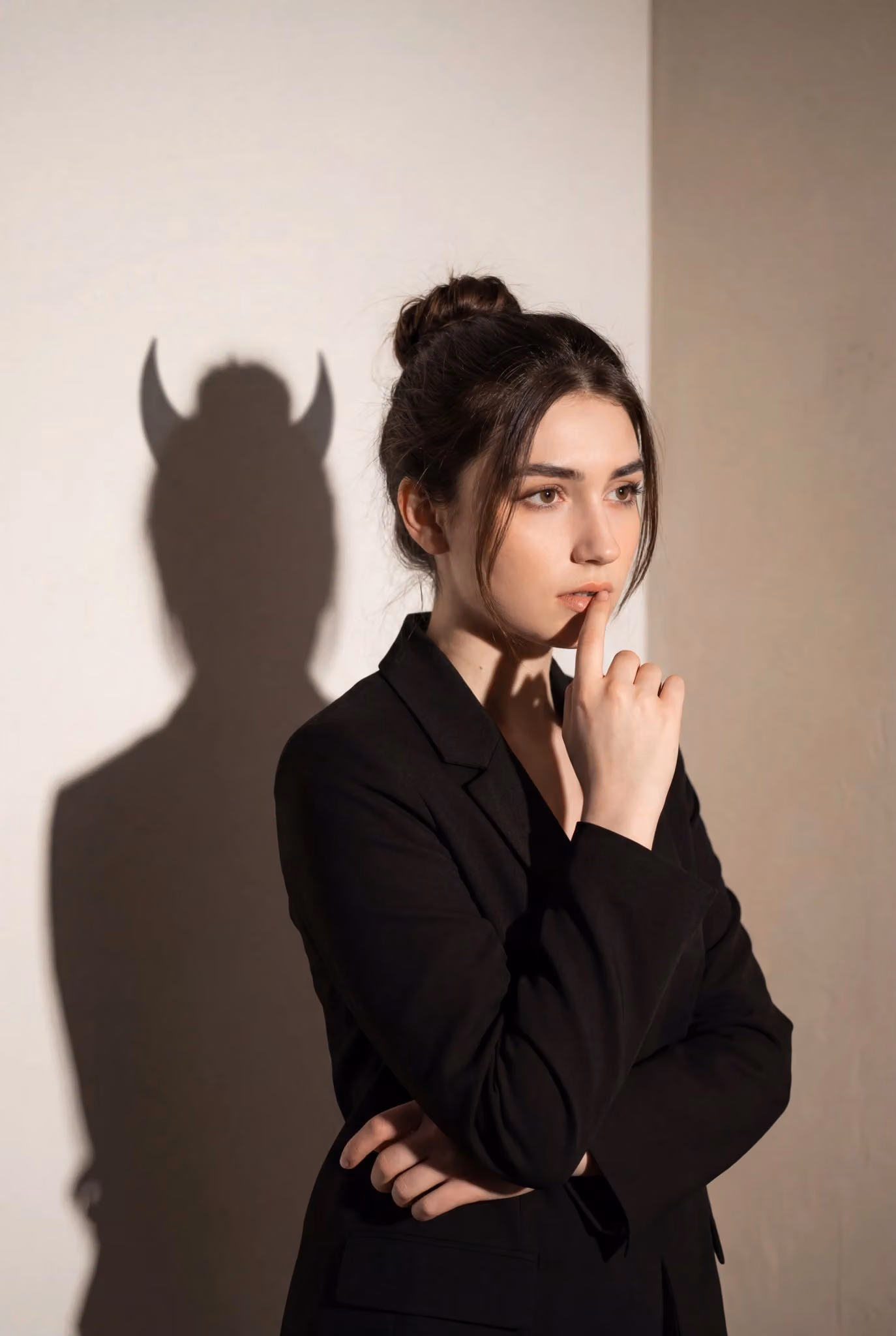 Conceptual Portrait: A Mysterious Woman with Symbolic Shadow